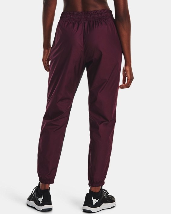 Women's Project Rock Woven Pants in Maroon image number 1